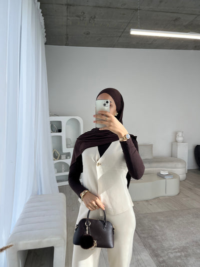 Beige sleeveless cardigan and trouser set