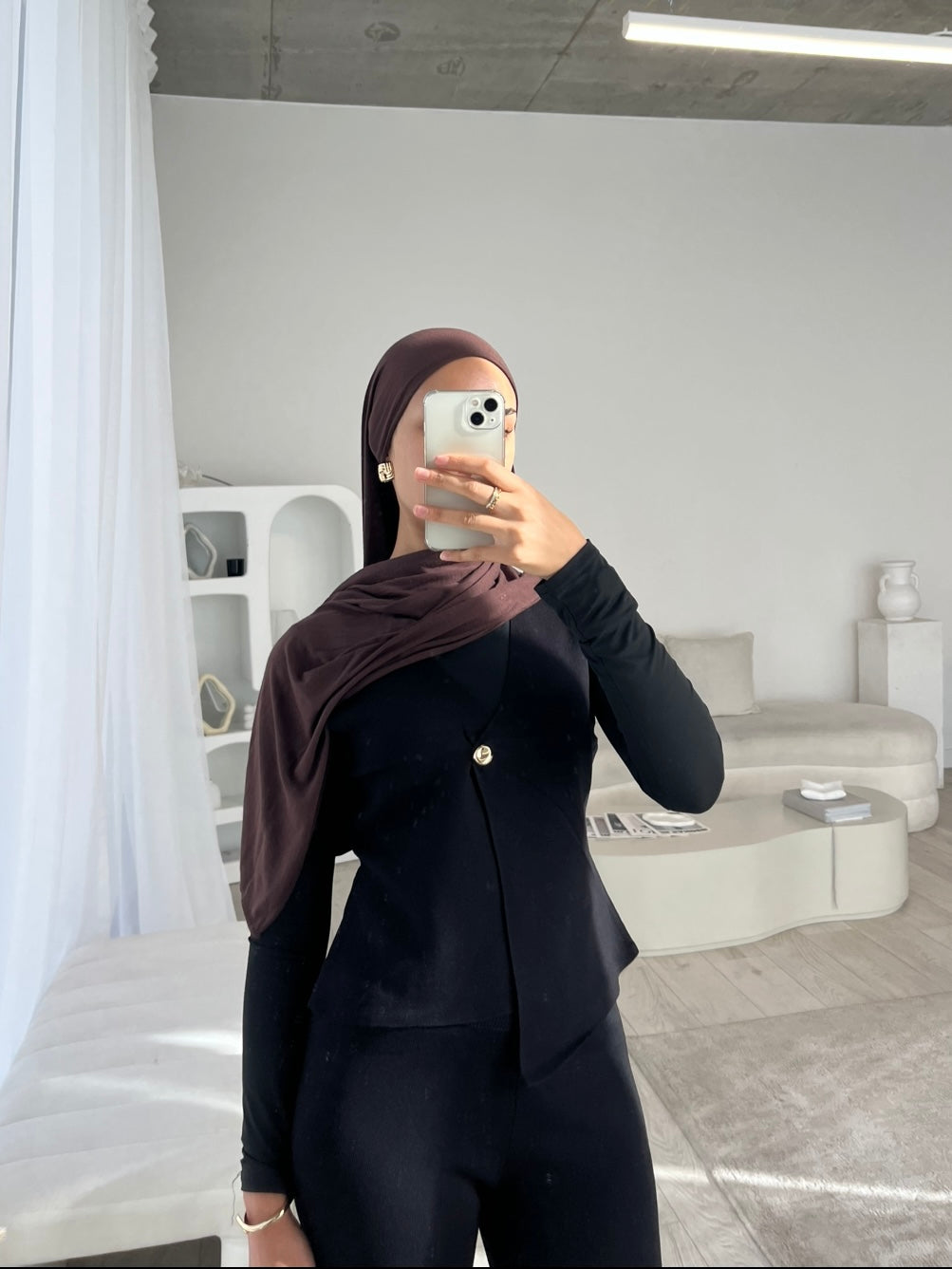 Black sleeveless cardigan and trouser set