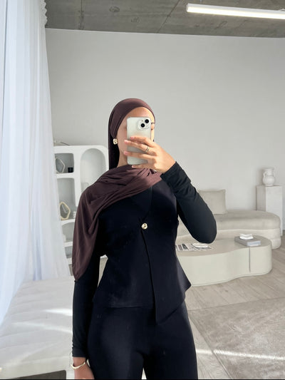 Black sleeveless cardigan and trouser set