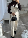 Beige sleeveless cardigan and trouser set