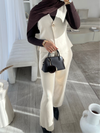Beige sleeveless cardigan and trouser set