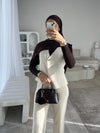 White sleeveless cardigan and trouser set