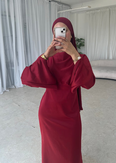 Red satin split belle sleeve dress