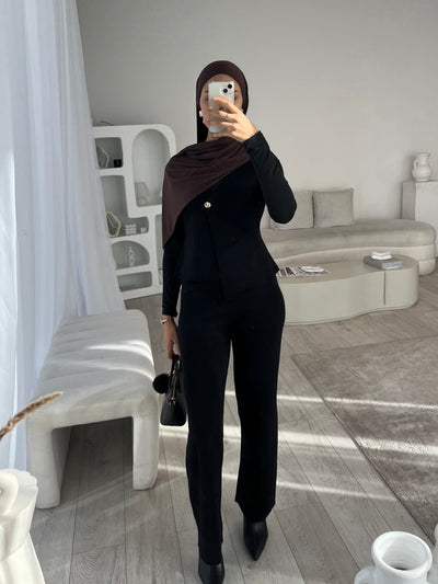 Black sleeveless cardigan and trouser set