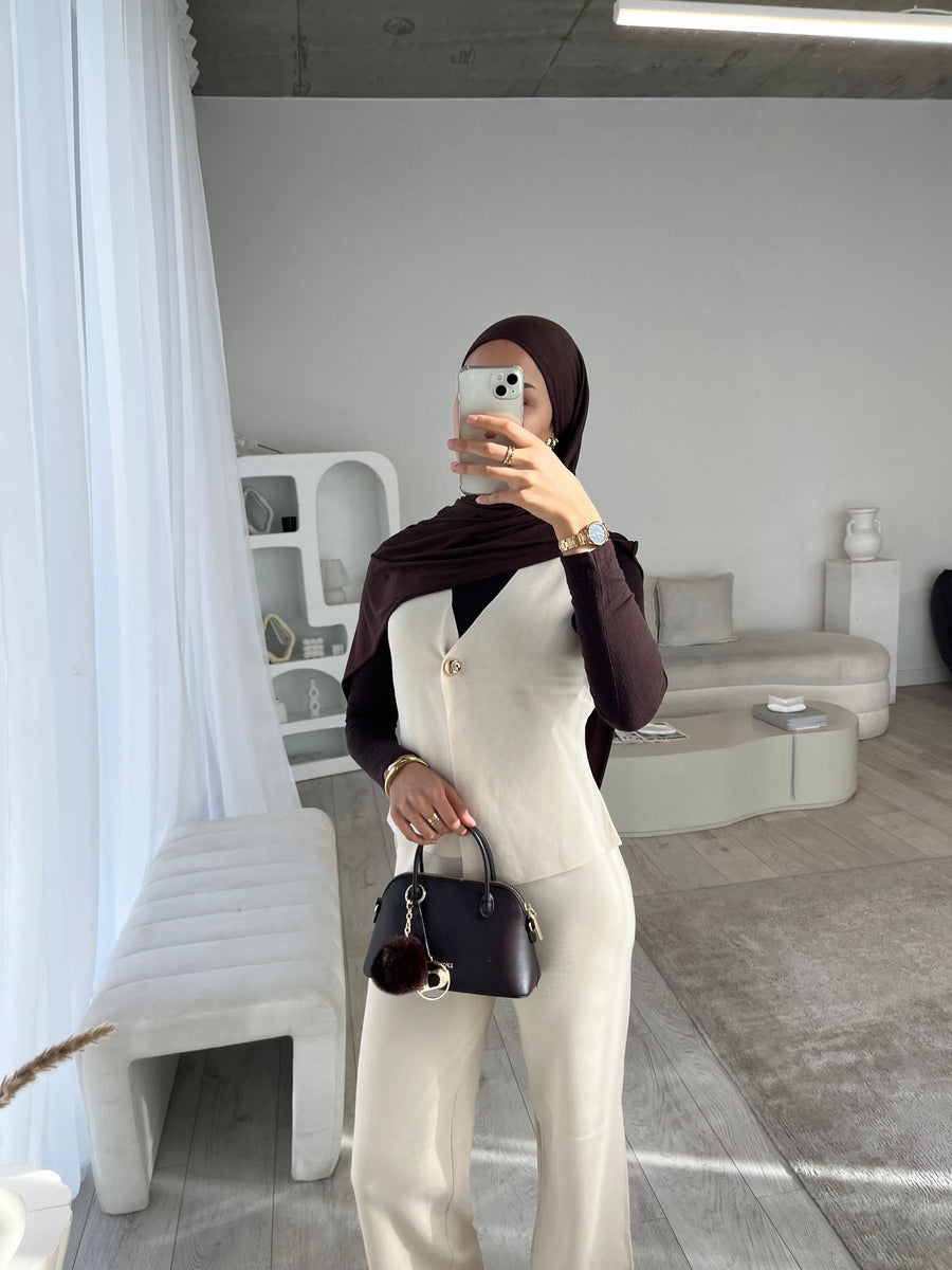 Beige sleeveless cardigan and trouser set