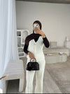 White sleeveless cardigan and trouser set